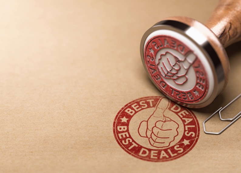 A red rubber stamp impression on brown paper reads