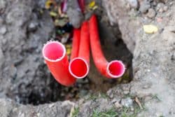 red pipes from soil underground
