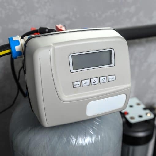 water softener control panel with pipes conencted
